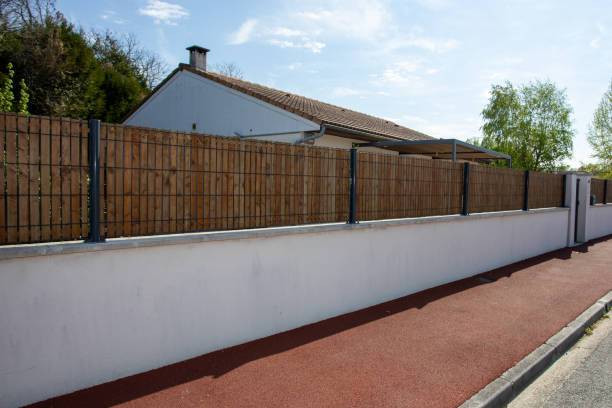 Devis pose de clôture rigide avec soubassement en béton  Le Havre