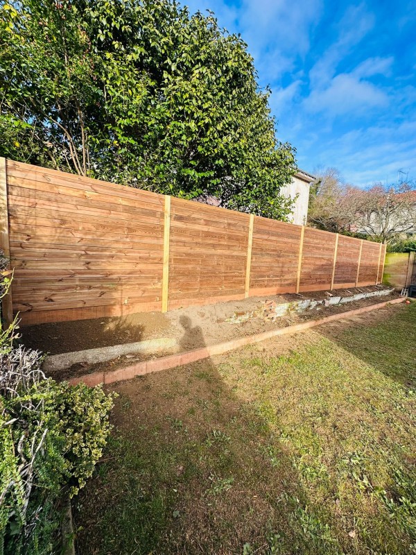 PJS - Espaces verts : pose d'une palissade bois classe 4 chez un particulier au Havre